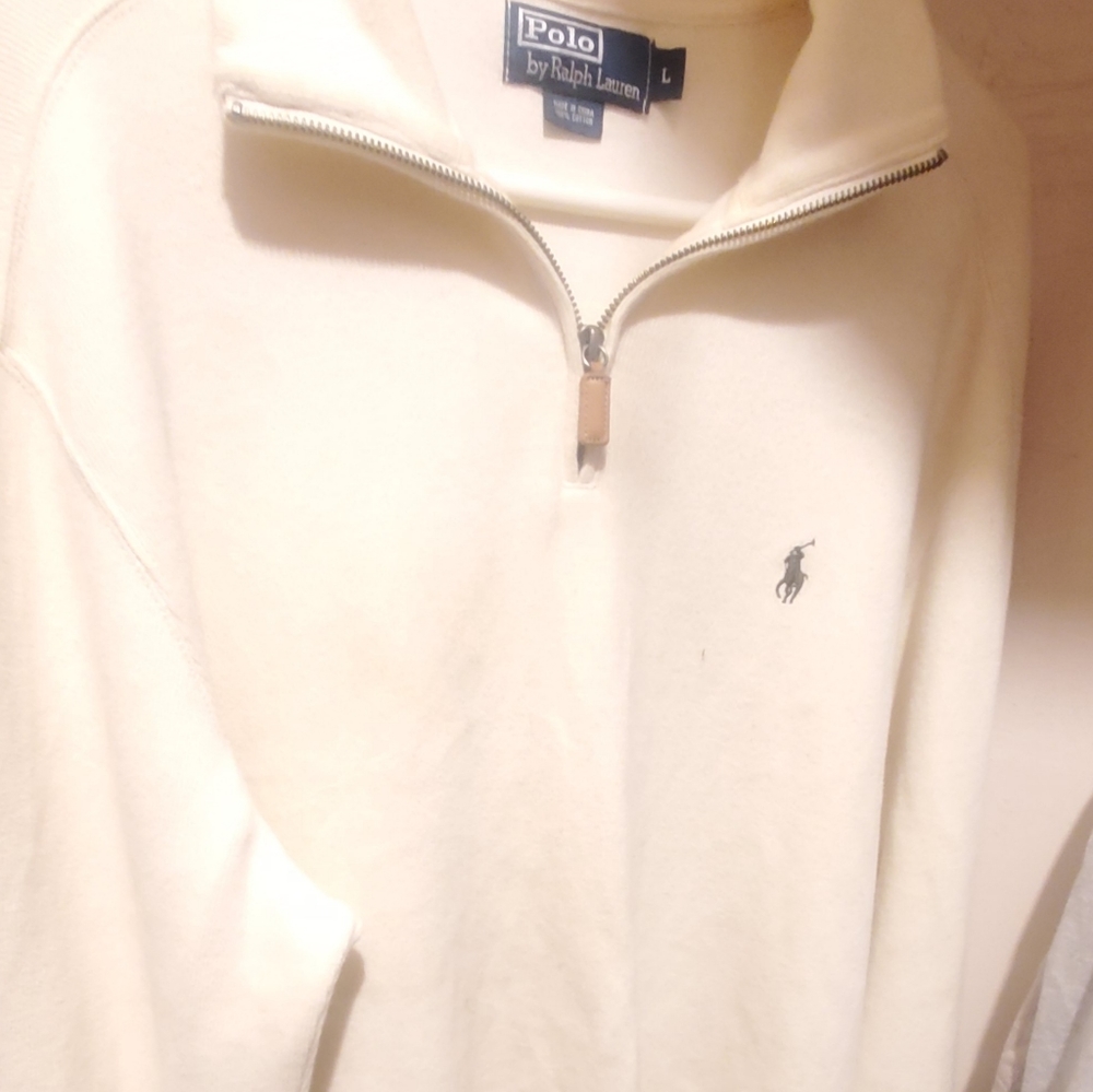 2 Polo sweaters. Zippers at the top.